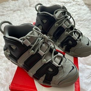 Nike boys uptempo sneakers. Never worn size 5Y fits women 7. Perfect condition